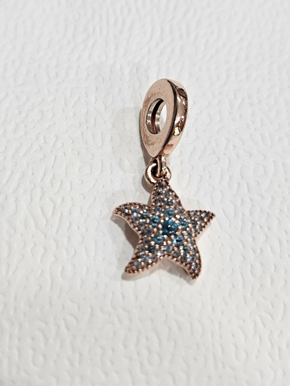 Pandora Rose Gold Starfish Dangle Charm with Blue Stones